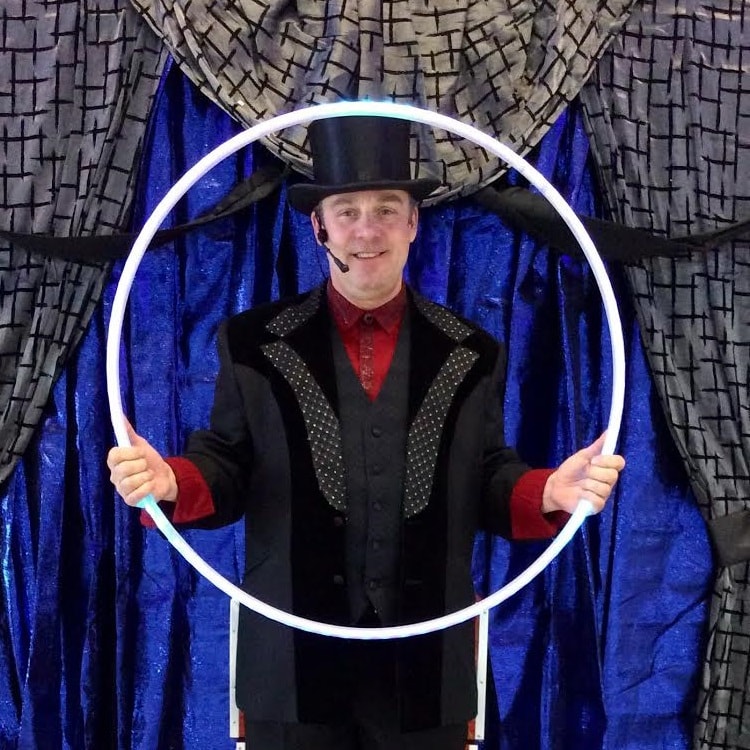 Magic Dave performing a comedy magic routine in northern Illinois